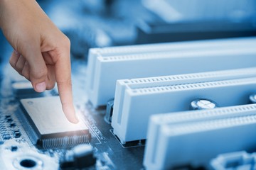 Composite image of hand pointing digital component