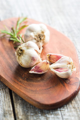 Fresh healthy garlic with rosemary.