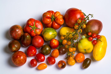 box with diferent tomatoes
