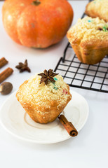 Pumpkin Apple Muffins with streusel. Thanksgiving concept. White background. Selective focus.