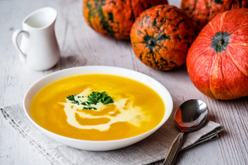 Pumpkin soup with cream and parsley. Vegan food