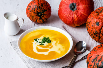 Pumpkin soup with cream and parsley. Vegan food