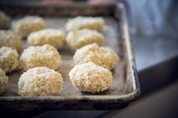 crab cakes about to go in the oven