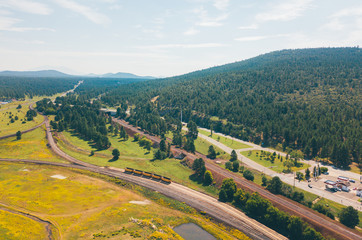 Aerial view of the Arizona forests and the American railway through the country near the town of...