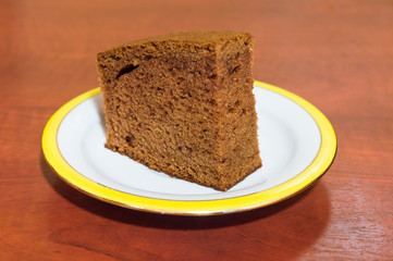 Gingerbread cake on plate.
