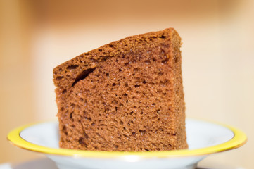 Gingerbread cake on plate.