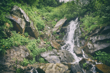 Obraz premium mountain river with waterfall