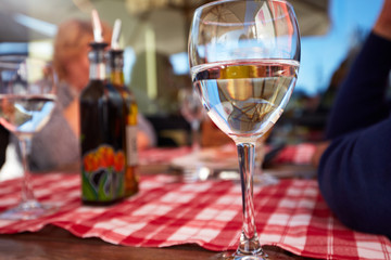 Pure drinking water glass at summer terrace cafe.