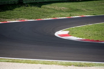 Gartenposter Racing and competiotion concept asphalt circuit track closeup limit borderline concept © fabioderby