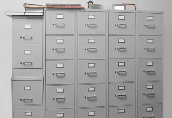 Cabinet with documents in archive