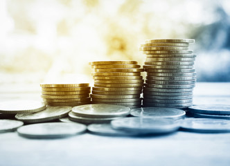 stack of money, rows of coins for finance and banking concept