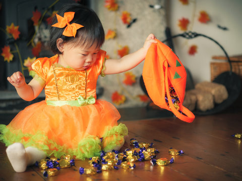 Baby girl celebrating her first halloween party