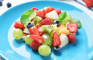 Plate with fruit salad, closeup
