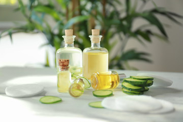 Bottles of cucumber lotion on table