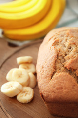 Tasty banana bread on wooden board