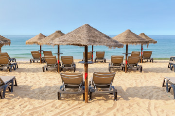 Sunbeds on the Portuguese beach in the summer in Albufeira.