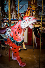 Fototapeta na wymiar Tiger on Merry-Go-Round