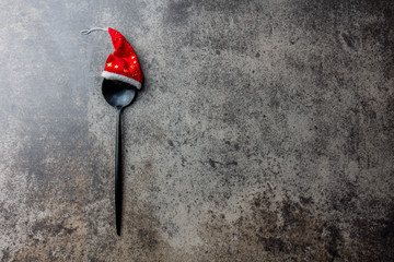 Holiday Christmas food background concept. Christmas menu concept. Cutlery spoon with Christmas...