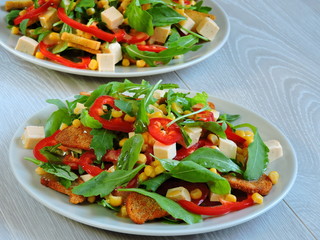 Two plates with a vegetarian salad. Top view.
