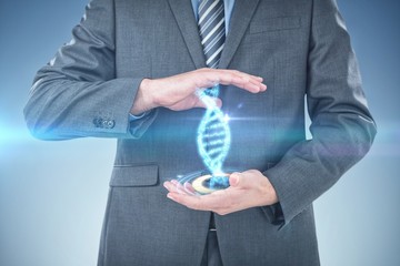 Composite image of mid section of businessman pretending to hold