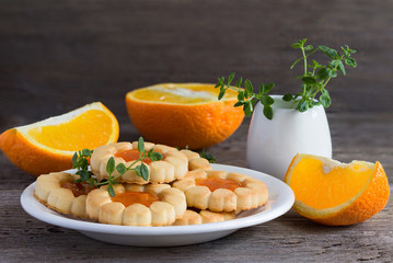 Biscuits with orange jam and thyme.