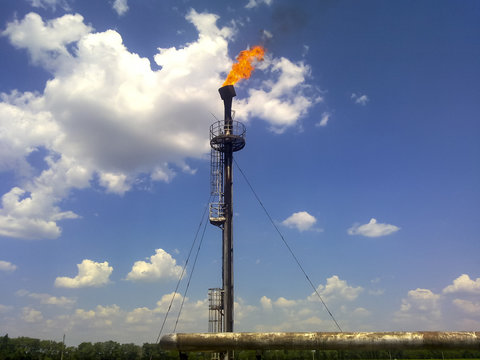 Flare for flaring associated gas. The end point of the pressure