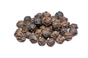 Black peppercorn against isolated on a white background