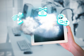 Composite image of feminine hand holding tablet
