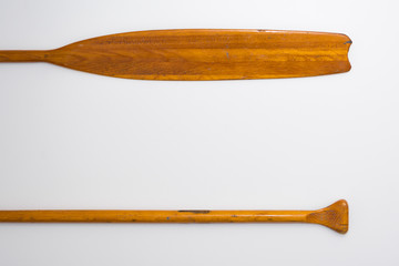 Vintage Wooden Paddle Oars Close Up on White Background