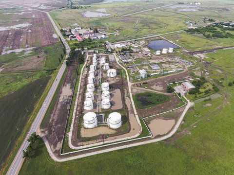 Aerial view of oil storage tanks. Industrial facility for the st