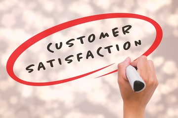 Composite image of hand writing with marker