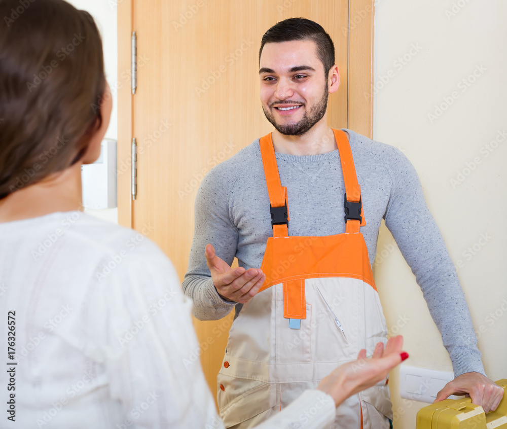 Wall mural worker came to call housewife