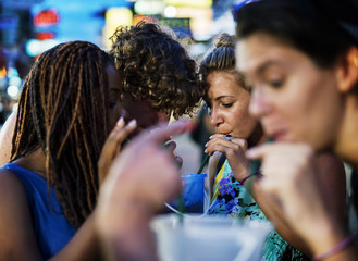 A group of tourists enjoying bucket drinks in Khao San Road,Bangkok, Thailand