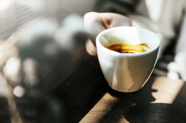 Young caucasian woman at a coffee shop
