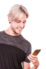 Young man using mobile phone texting on smartphone