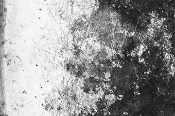 Grunge black and white abstract background or texture with distress scratch.
