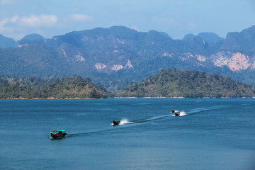 Long tail motor boats cruise in the lake, Khao Sok National Park ,Suratthani,Thailand.