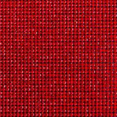 Canvas of red rhinestones. Background.