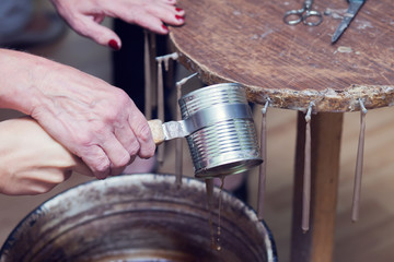 Obraz premium Antique way of making candles