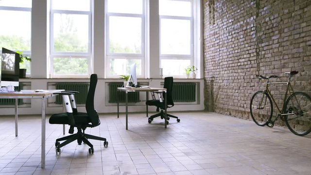 The interior of big bright empty modern office after work.