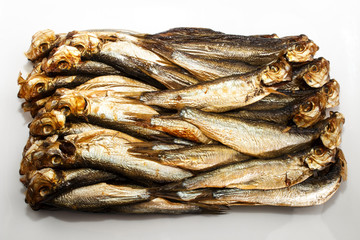smoked sprats on white background