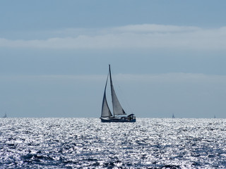 Obraz premium Sailing yacht in Croaatia, windy summer on the boat between rocky islands of the Mediterranean sea
