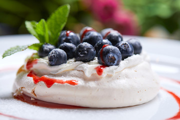 meringue dessert with fresh berries