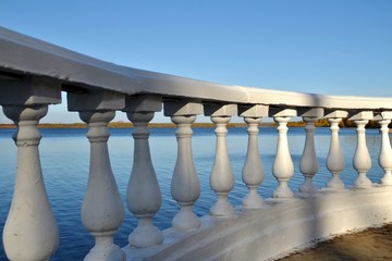 Balustrade in the city park on the lake, observation deck