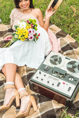 girl with flowers and tape recorder