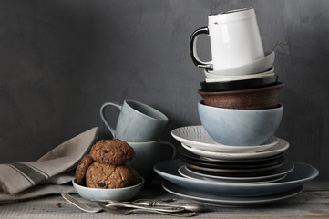 Crockery and cookies on kitchen table