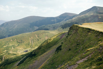 Fototapeta premium The mountain view with the nice sky in the warm sun light