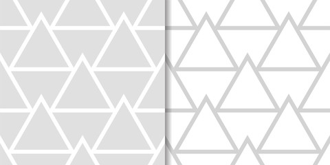 Light gray geometric ornaments. Set of seamless patterns for web, textile and wallpapers