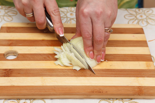 Food preparation - cutting onions with knife