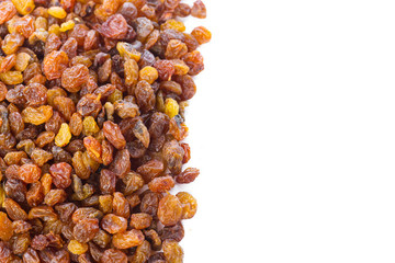 Dried raisins on a white background